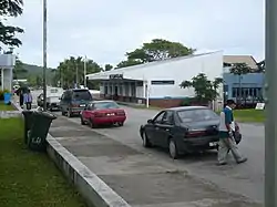 Alofi locals walking along a street