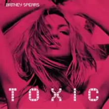 Image of a blonde woman with a layer of pink. She has her arms extended over her head. On the upper left side of the image, the words "Britney Spears" are written in white letters. Underneath, 《中你的毒》 is written in big white letters.