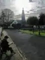 Bewerkte foto van het begijnhof met de Sint-Catharinakerk op de achtergrond