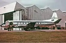 A Vickers Viscount aircraft on a runway, photographed from the port side