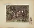 Jinriki, 1886. Hand-coloured albumen print on a decorated album page.A rickshaw driver, two passengers and a bearer.