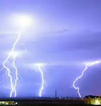 Four bolts of lightning strike the ground