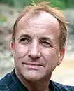 麥可‧薛莫（英语：）（Michael Shermer），科學作家、科學史學家、The Skeptics Society（英语：）創辦人