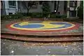 A tiled triskelion in a park in Tokyo, Japan.