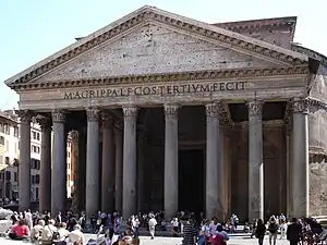 ancient temple fronted by eight huge pillars