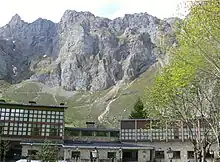  Cliffs and scree slopes above the parador at Fuente De in the Picos de Europa