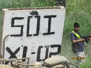 SOI boy at check point