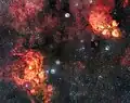 VLT的巡天望遠鏡拍攝的貓掌星雲和龍蝦星雲（Lobster Nebula）。