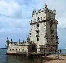 White tower near the sea