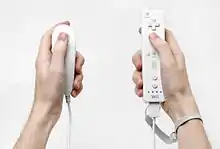 A standard Wiimote shown with Nunchuck