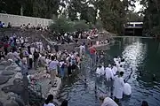 Baptism ceremony at Yardenit