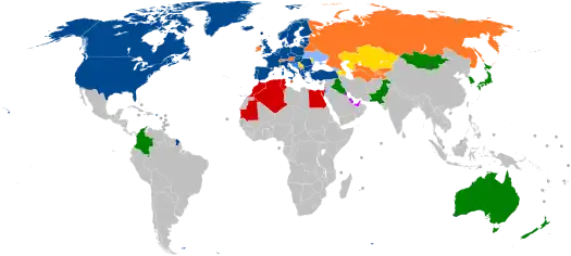 A world map with countries in blue, cyan, orange, yellow, purple, and green, based on their NATO affiliation.