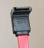 A 7-pin Serial ATA data cable.