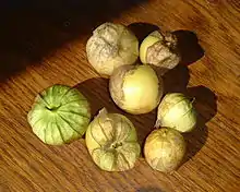 A group of tomatilloes on a table